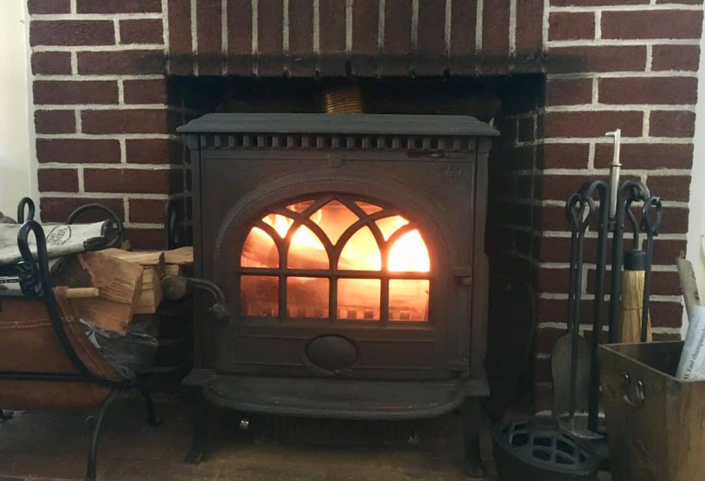 wood stove in fireplace