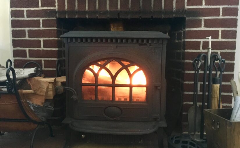 wood stove in fireplace